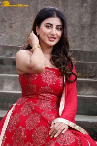Actress Shweta Avasthi in a red dress
