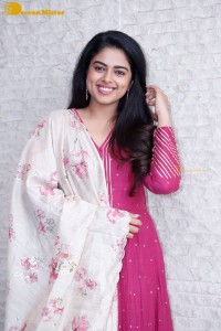 Actress Siddhi Idnani in a pink salwar dress