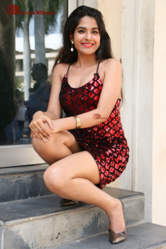 Telugu Actress Simar in a black and red dress