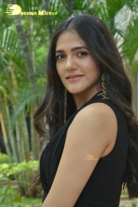 Actress Simran Choudhary poses in a Black Dress for a Photoshoot