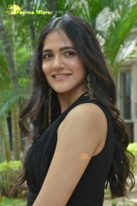 Actress Simran Choudhary poses in a Black Dress for a Photoshoot