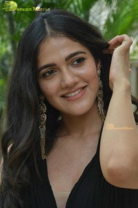 Actress Simran Choudhary poses in a Black Dress for a Photoshoot