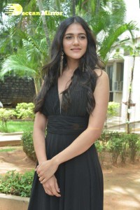 Actress Simran Choudhary poses in a Black Dress for a Photoshoot