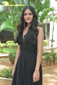 Actress Simran Choudhary poses in a Black Dress for a Photoshoot