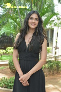 Actress Simran Choudhary poses in a Black Dress for a Photoshoot