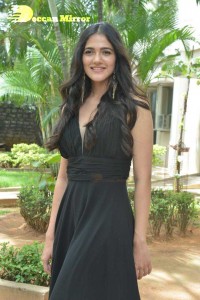 Actress Simran Choudhary poses in a Black Dress for a Photoshoot