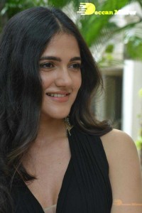 Actress Simran Choudhary poses in a Black Dress for a Photoshoot