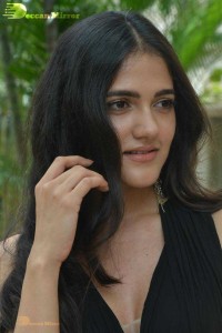 Actress Simran Choudhary poses in a Black Dress for a Photoshoot