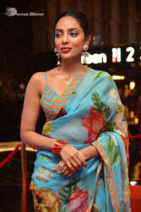 Model turned Actress Sobhita Dhulipala poses for pictures at a cinema event