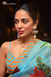 Model turned Actress Sobhita Dhulipala poses for pictures at a cinema event