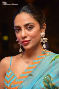 Model turned Actress Sobhita Dhulipala poses for pictures at a cinema event