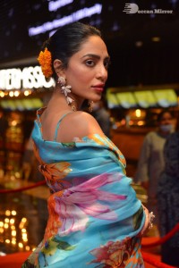 Model turned Actress Sobhita Dhulipala poses for pictures at a cinema event