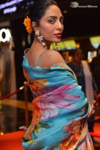 Model turned Actress Sobhita Dhulipala poses for pictures at a cinema event