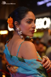Model turned Actress Sobhita Dhulipala poses for pictures at a cinema event
