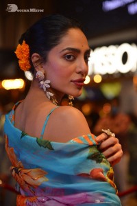 Model turned Actress Sobhita Dhulipala poses for pictures at a cinema event