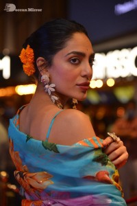 Model turned Actress Sobhita Dhulipala poses for pictures at a cinema event