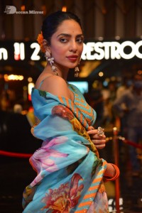Model turned Actress Sobhita Dhulipala poses for pictures at a cinema event