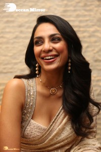 Actress Sobhita Dhulipala in a gold color saree