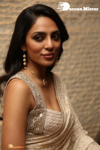 Actress Sobhita Dhulipala in a gold color saree