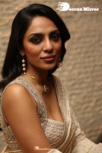 Actress Sobhita Dhulipala in a gold color saree