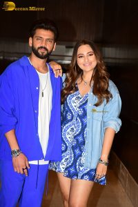 actress sonakshi sinha in a short blue dress with her husband