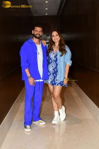 actress sonakshi sinha in a short blue dress with her husband