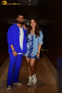 actress sonakshi sinha in a short blue dress with her husband