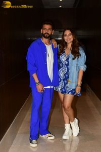 actress sonakshi sinha in a short blue dress with her husband