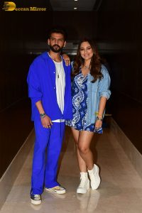 actress sonakshi sinha in a short blue dress with her husband
