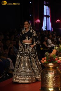 actress Sonakshi Sinha ramp walk in a black lehenga choli dress
