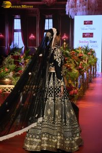 actress Sonakshi Sinha ramp walk in a black lehenga choli dress