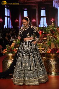 actress Sonakshi Sinha ramp walk in a black lehenga choli dress