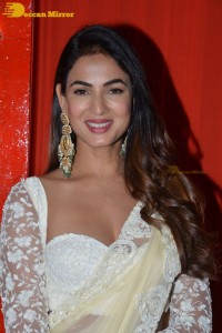 Actress Sonal Chauhan in a light yellow saree