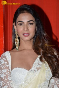 Actress Sonal Chauhan in a light yellow saree