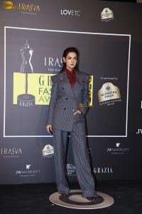 actress sonal chauhan classy looks in a pant suit