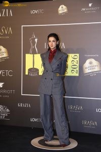 actress sonal chauhan classy looks in a pant suit