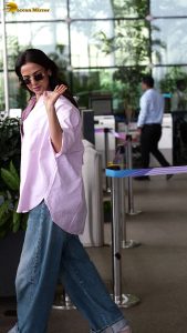 actress sonal chauhan gorgeous in a shirt and denim jeans