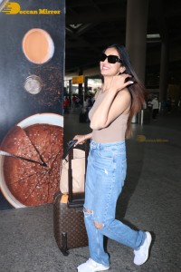 Sonal Chauhan seen at Mumbai Airport in a brown top and denim jeans