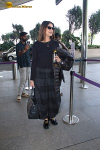 actress Sonali Bendre spotted at the airport in a black dress