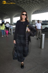 actress Sonali Bendre spotted at the airport in a black dress