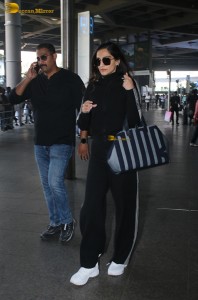 Bollywood actress Sonam Kapoor in a black track suit spotted at mumbai airport