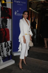 bollywood actress and anil kapoor’s daughter Sonam Kapoor in a white suit at an event