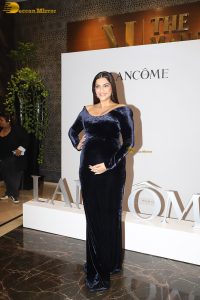 actress sonam kapoor in a black dress showing baby bump