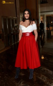 sonam kapoor hot looks in a white shoulderless top and red skirt at an event