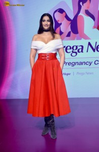 sonam kapoor hot looks in a white shoulderless top and red skirt at an event