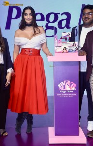 sonam kapoor hot looks in a white shoulderless top and red skirt at an event