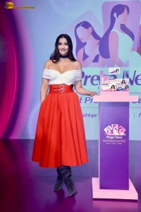 sonam kapoor hot looks in a white shoulderless top and red skirt at an event
