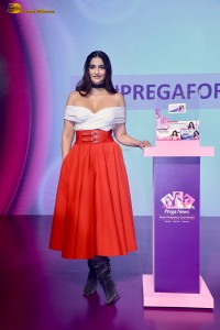 sonam kapoor hot looks in a white shoulderless top and red skirt at an event