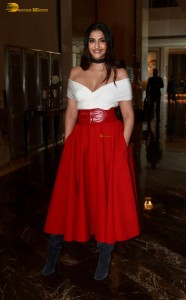 sonam kapoor hot looks in a white shoulderless top and red skirt at an event
