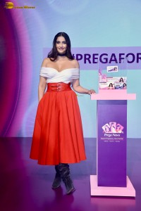 sonam kapoor hot looks in a white shoulderless top and red skirt at an event